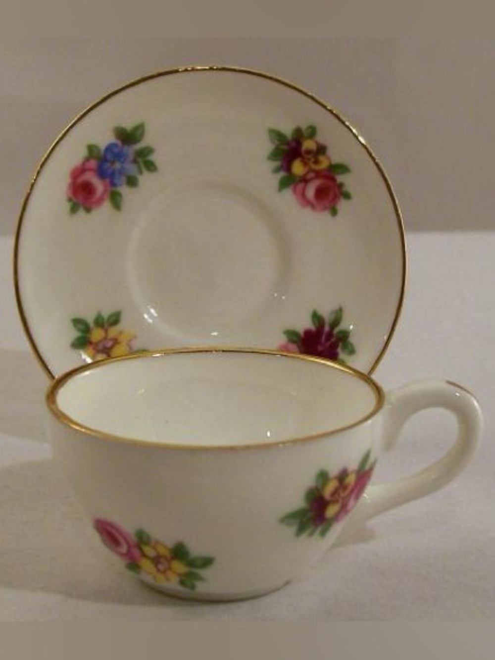 1 Vintage Royal Adderley Floral miniature teacup and saucer set.